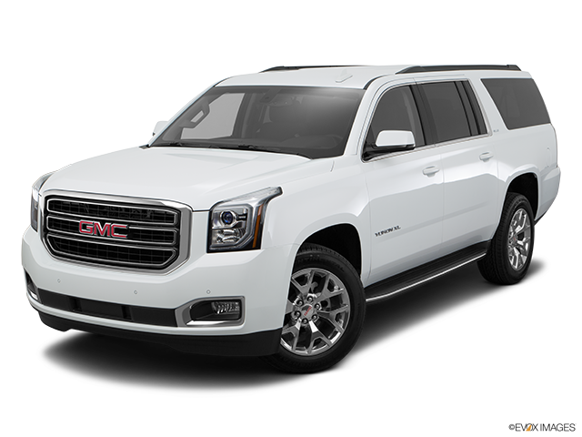 白色GMC Yukon XL休旅車 壁紙 — 一輛純白色的GMC Yukon XL SUV在攝影棚中展示，線條簡潔，帶有鍍鉻裝飾。