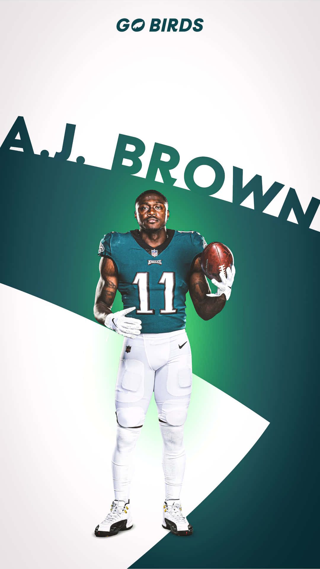 橄欖球運動員 A.J. Brown 身穿老鷹隊裝備，手持帶有球隊標誌的球。