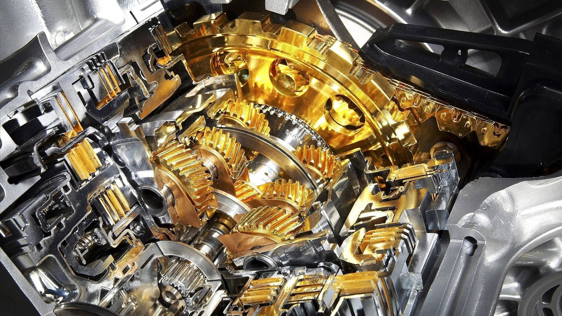 閃亮銀色金屬與黃金機械裝置。