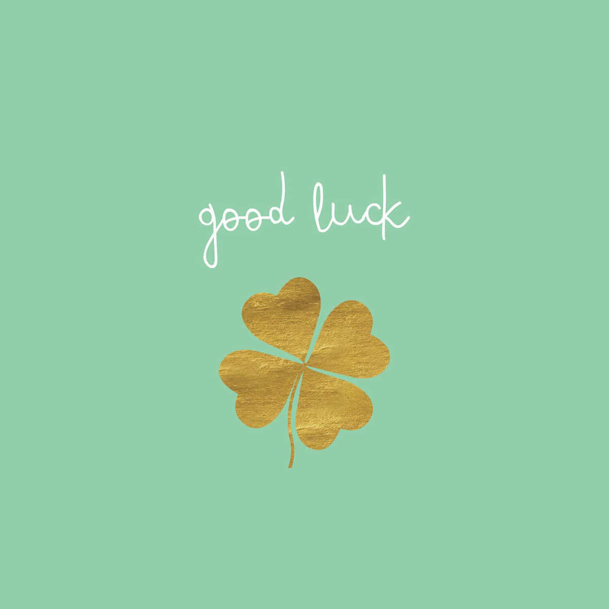  壁紙 — 金色四葉草，中心帶有「good luck」文字，背景為薄荷綠色。
