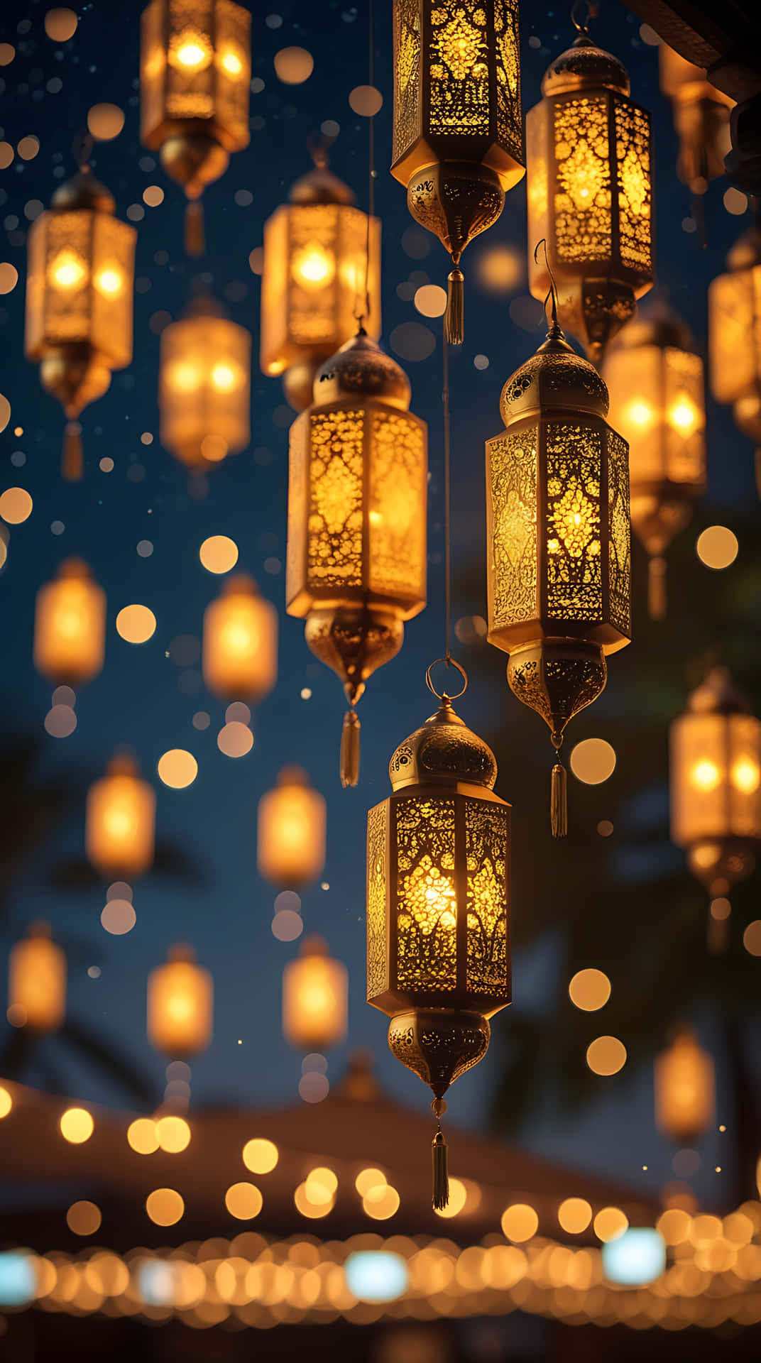 Golden Lantern Glow with Ramadan Kareem Greetings. smartphone wallpaper 壁紙 — 金色華麗燈籠在深藍色夜空下溫暖發光，伴隨柔和散景燈光。