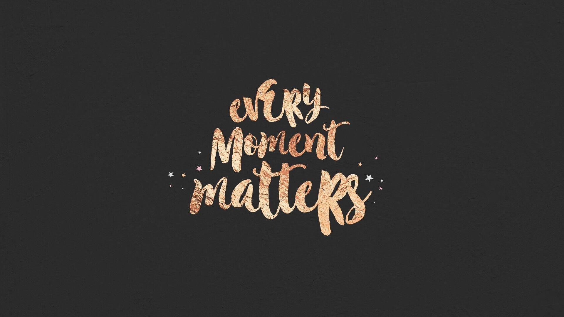 金色書法文字在深色背景上寫著「Every Moment Matters」，並帶有小星星