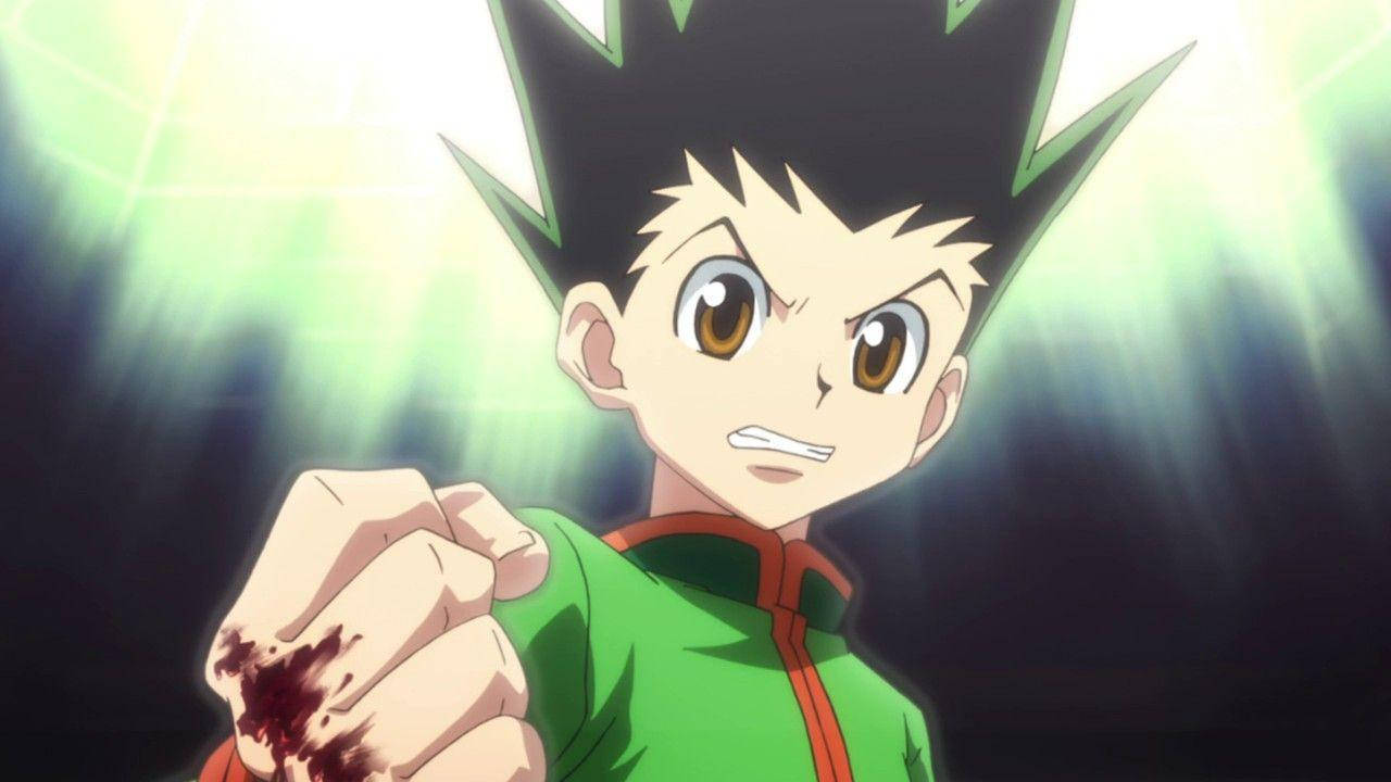 動漫男孩血淋淋拳頭發光綠色背景