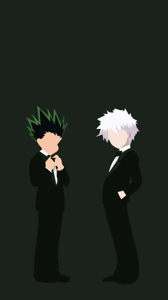 Gon 與 Killua 的手機壁紙 壁紙 — 兩個身穿黑色西裝的動漫角色在黑暗背景下相對而立，一個有綠色尖刺頭髮，另一個有白色頭髮。