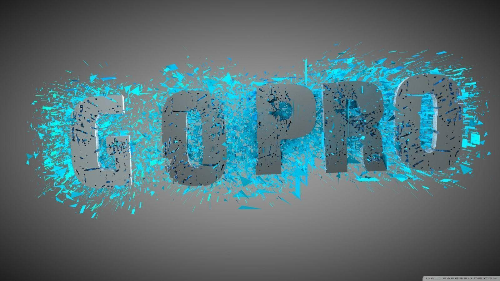 GoPro 品牌名稱像素編輯圖 壁紙 — 金屬字體 'GOPRO' 在深灰色背景上爆發出鮮豔的藍色碎片。