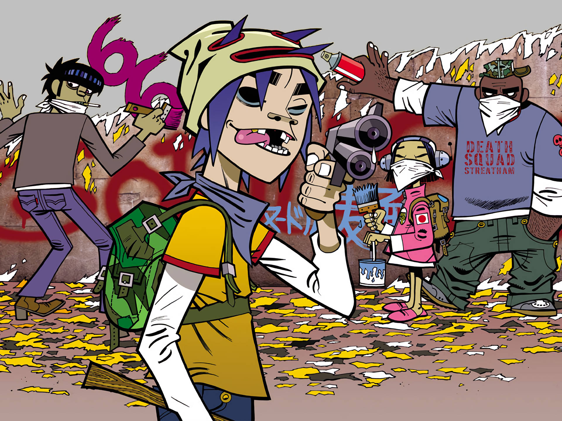 「Gorillaz塗鴉藝術」 壁紙 — 一群塗鴉團隊手持噴漆罐和口罩，在黃色紙屑飄落的背景下，以充滿活力的卡通風格在牆上塗鴉。