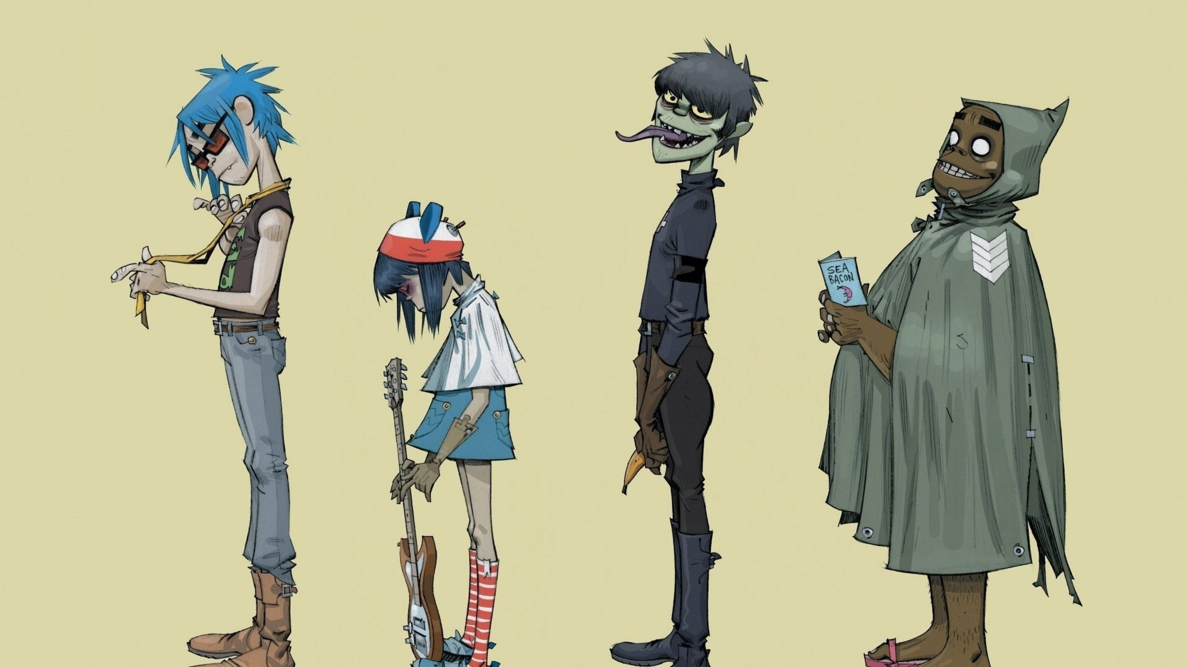 Gorillaz的單色魅力展現 壁紙 — 四個風格化的動畫樂隊成員側面站立在純米色背景前，每人手持樂器或物品。