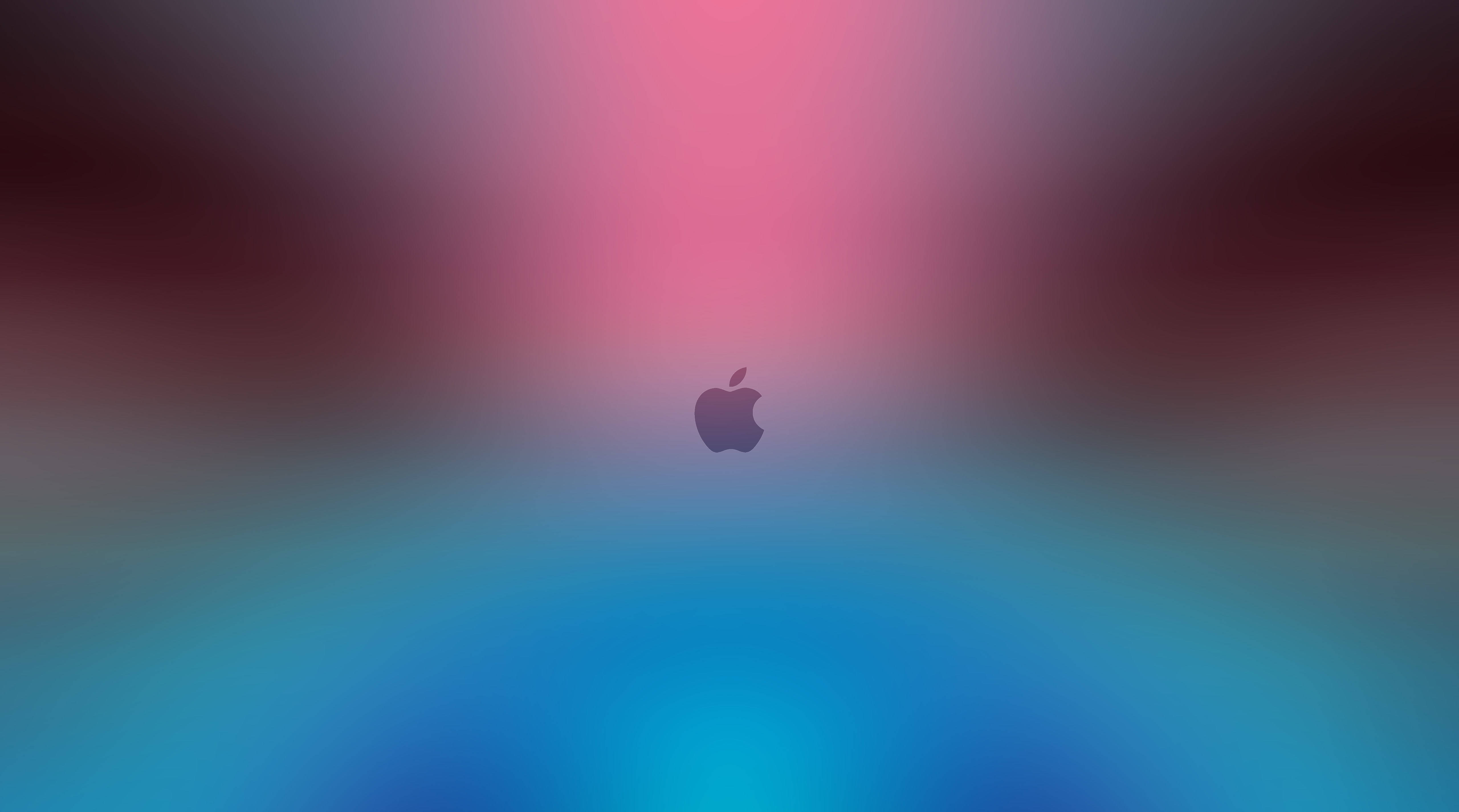 藍粉漸層 MacBook Air 壁紙 — 一個極簡的Apple標誌，置中於粉紅和藍色的柔和漸變背景上。