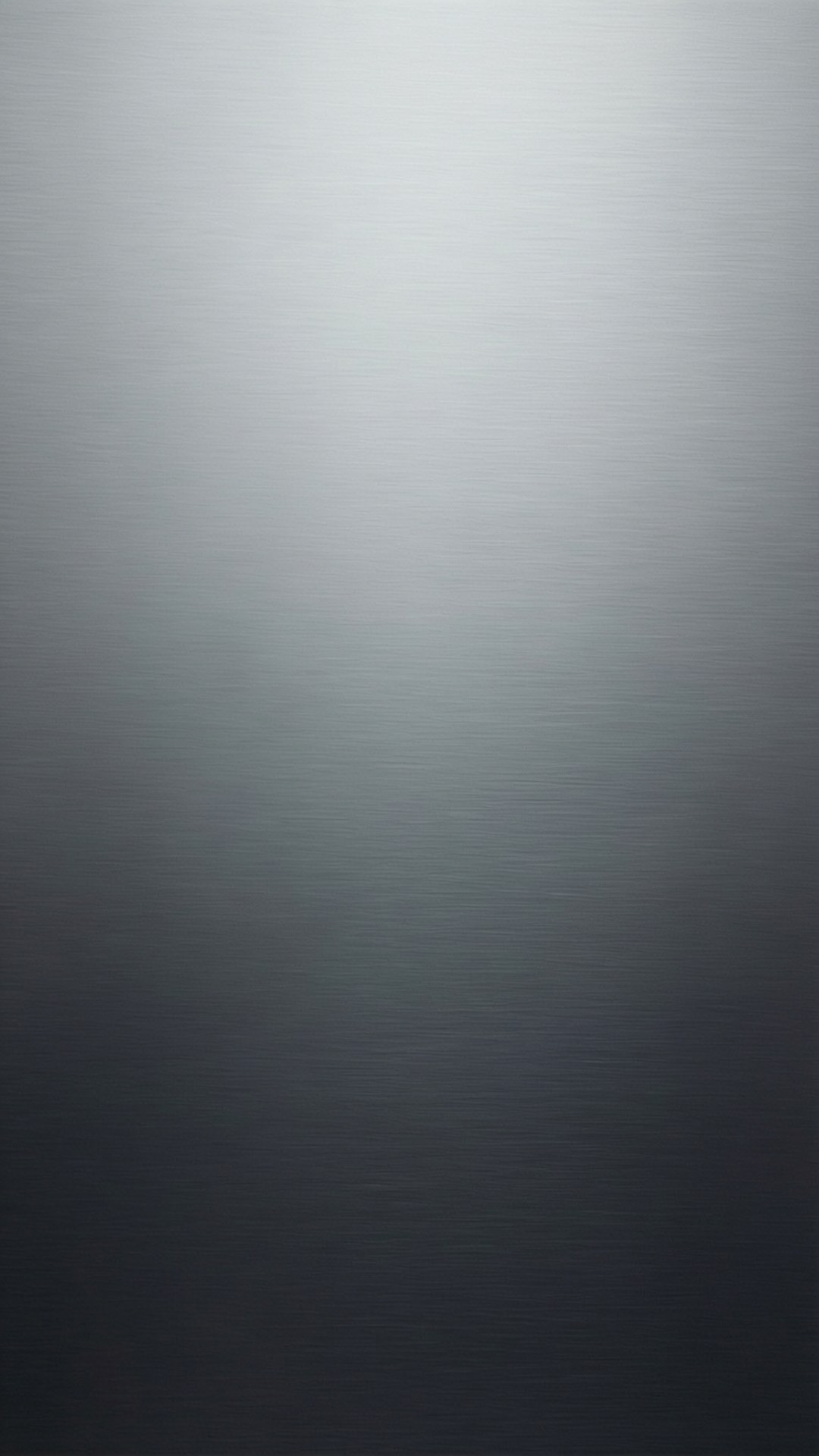從銀色到炭灰色的垂直刷紋金屬漸變