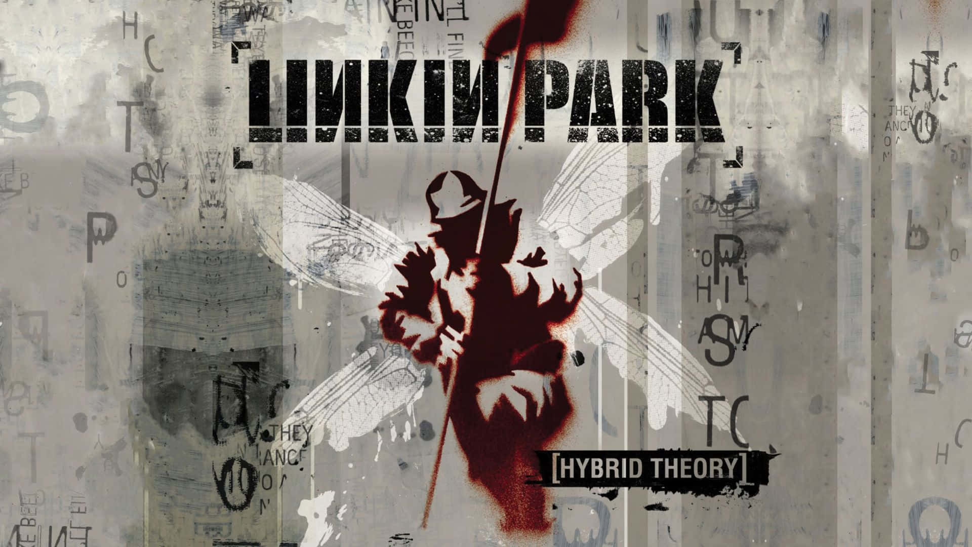  壁紙 — 一張粗糙紋理的牆紙，帶有紅色翅膀的天使剪影，以及「LINKIN PARK」和「HYBRID THEORY」文字疊加在由碎片字母組成的混亂背景上。