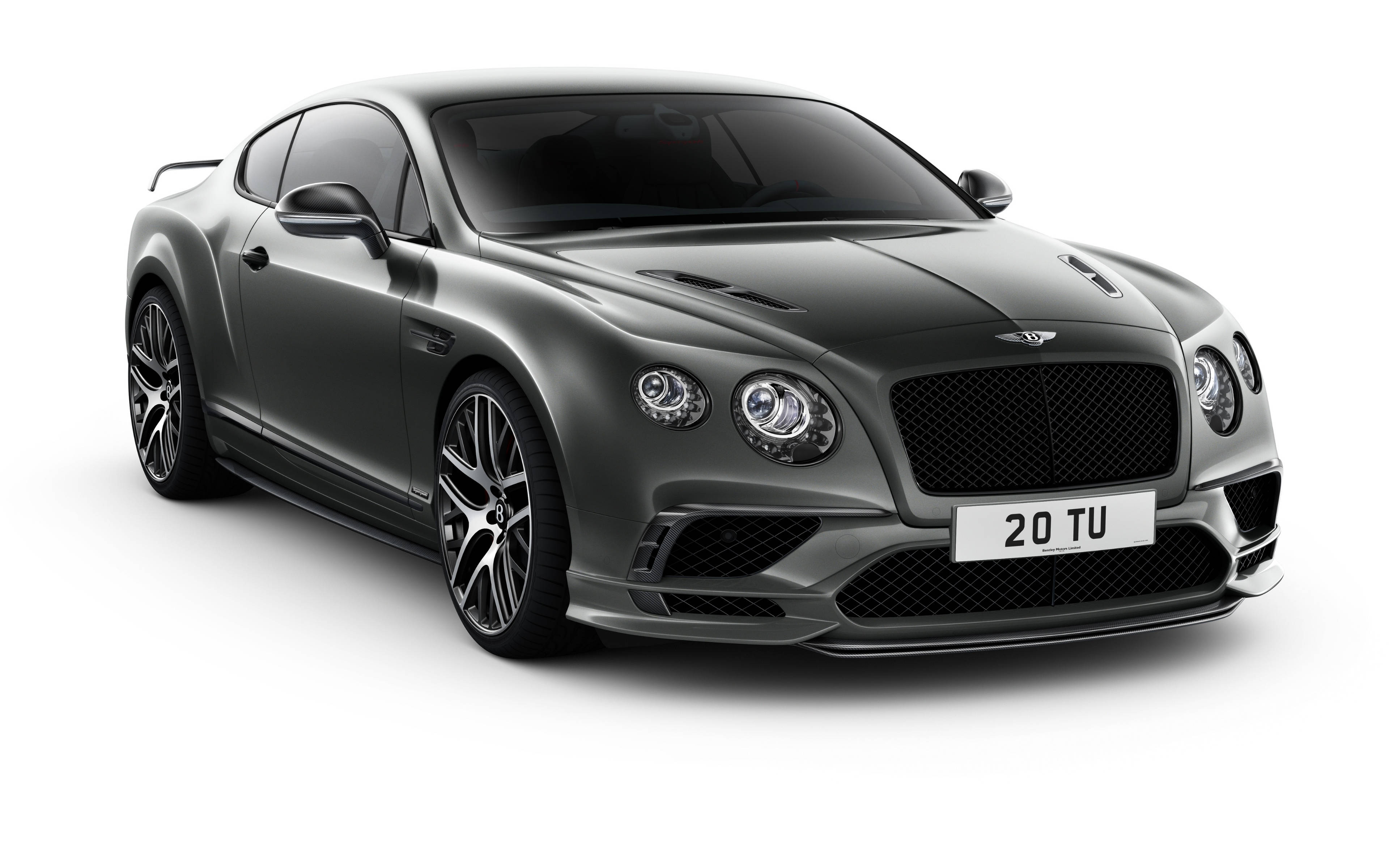 黑色賓利歐陸GT 高清壁紙 壁紙 — 一輛時尚的啞光灰色賓利 Continental GT Speed 雙門轎跑車，在攝影棚燈光下以潔白背景展示。