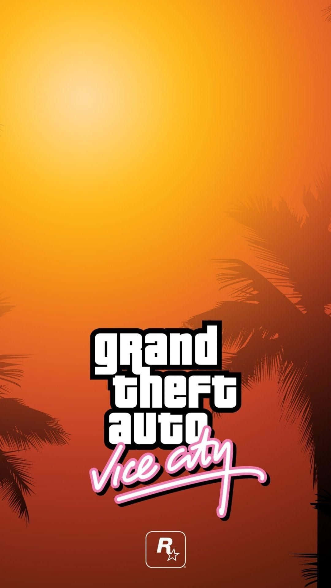 GTA Vice City 日出時分 壁紙 — 充滿活力的日落天空，棕櫚樹剪影襯托著標誌性的 Grand Theft Auto Vice City 標誌。