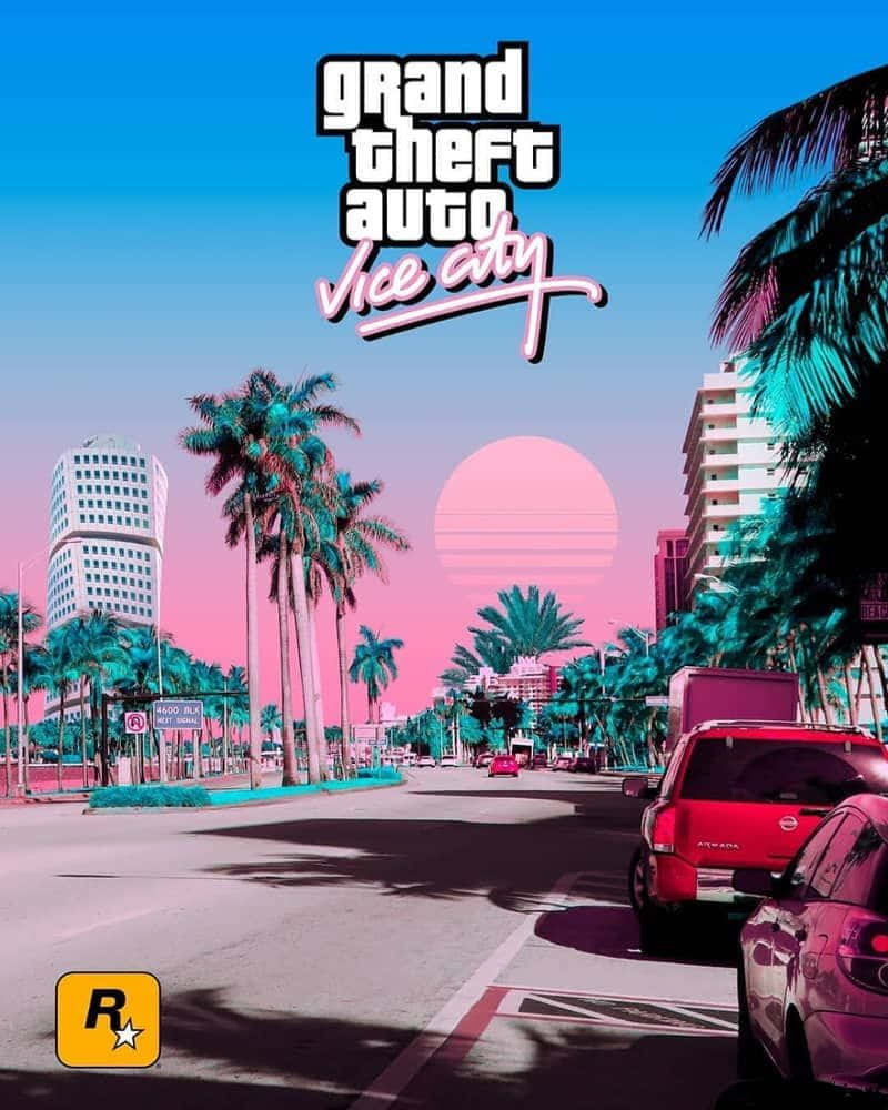 GTA Vice City 棕櫚樹街道背景 壁紙 — 充滿活力的復古未來主義城市街道，有棕櫚樹和粉紅色的太陽，藍天下帶有Grand Theft Auto Vice City標誌。