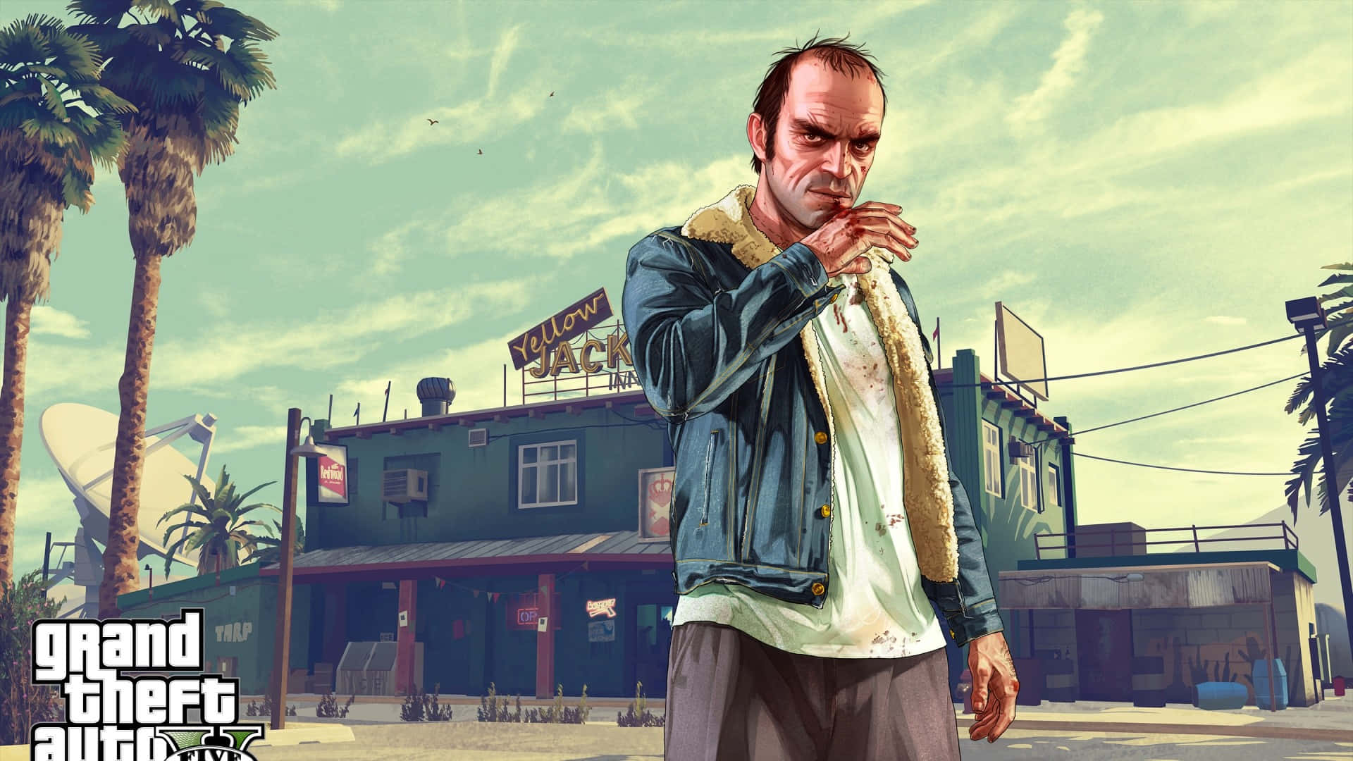 GTA 特雷弗·菲利普斯穿夾克背景 壁紙 — 一個身穿牛仔褸的粗獷電子遊戲主角，站在陽光明媚的城市街道上，背景有棕櫚樹和「Yellow Jack」餐廳。