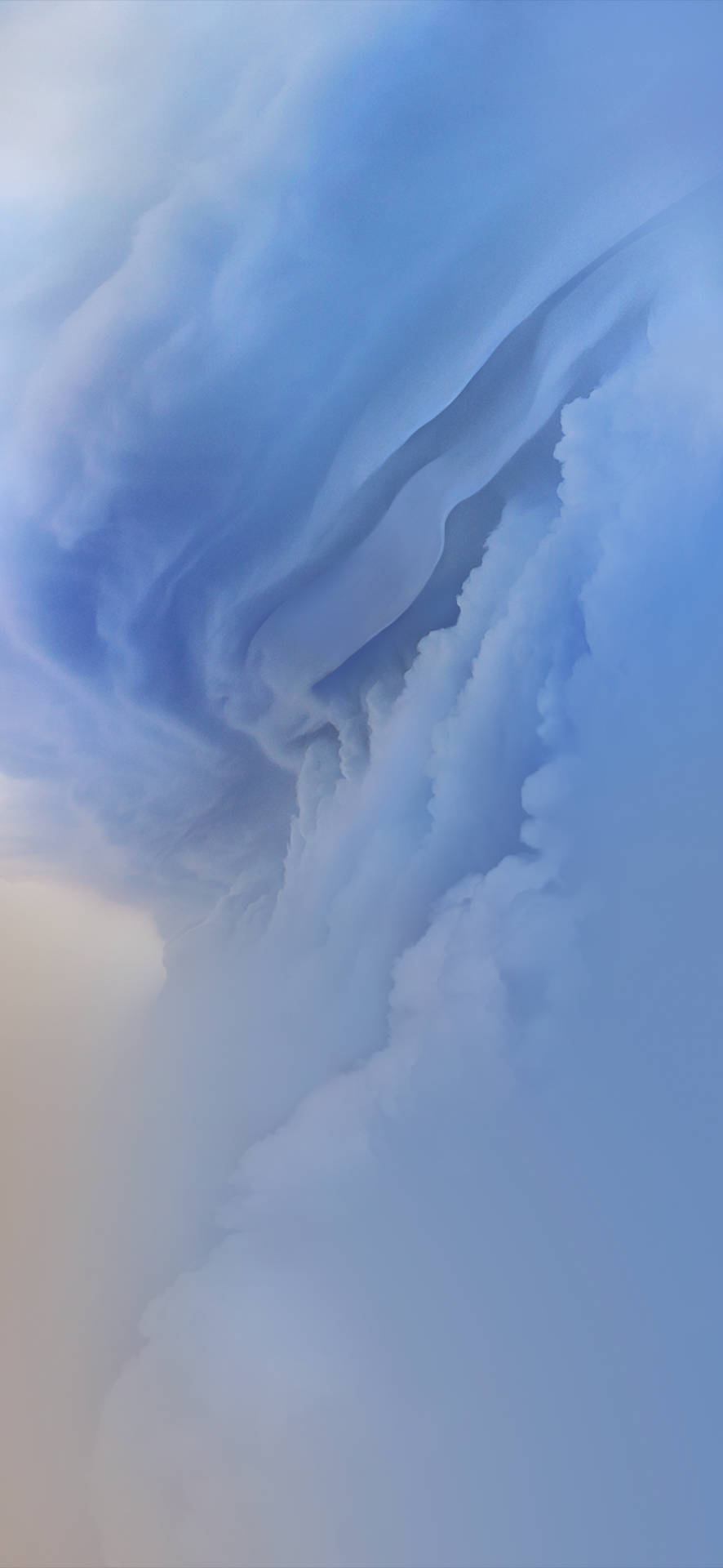 寧靜的抽象天空，帶有漩渦狀的藍白雲朵。