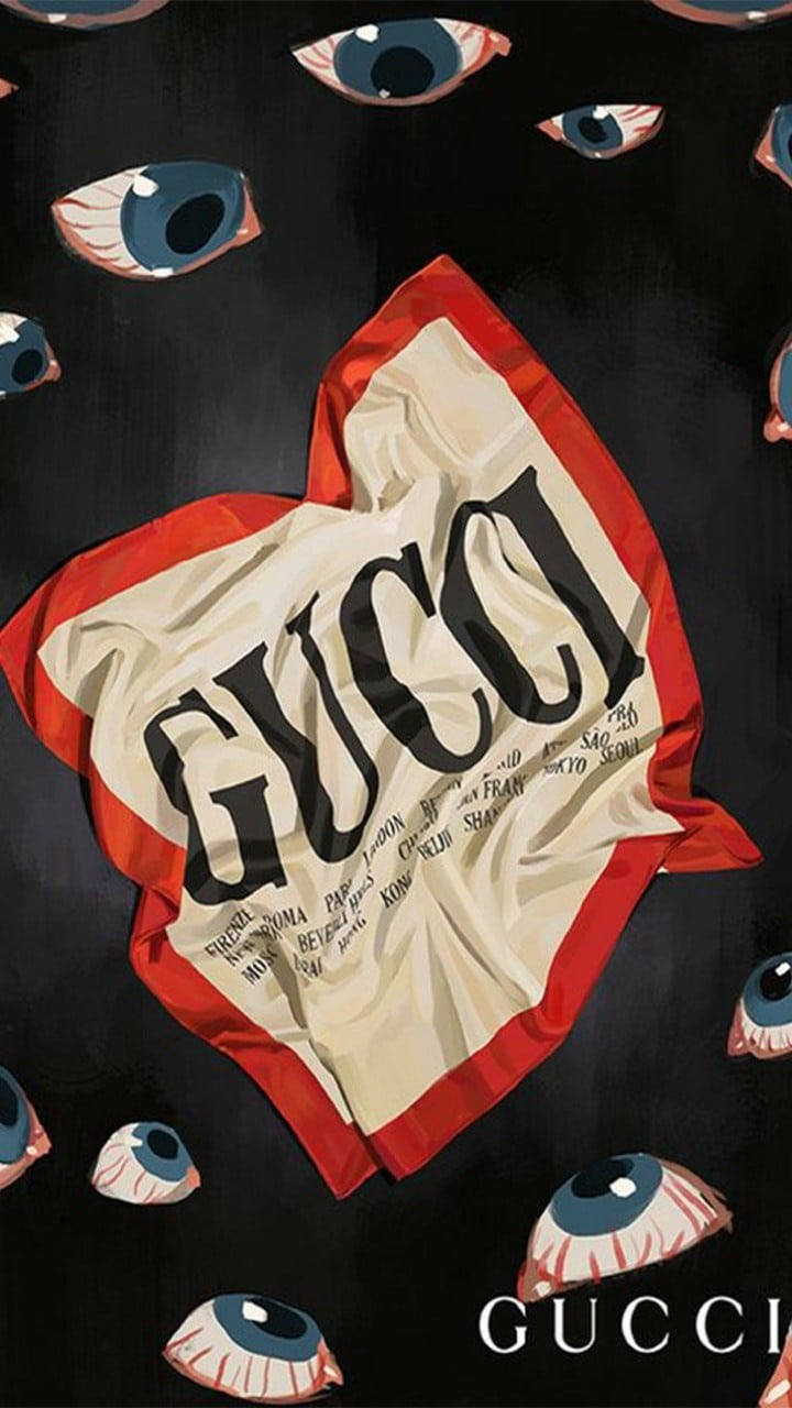 Gucci 圍巾被漂浮的眼球包圍在黑暗背景上。