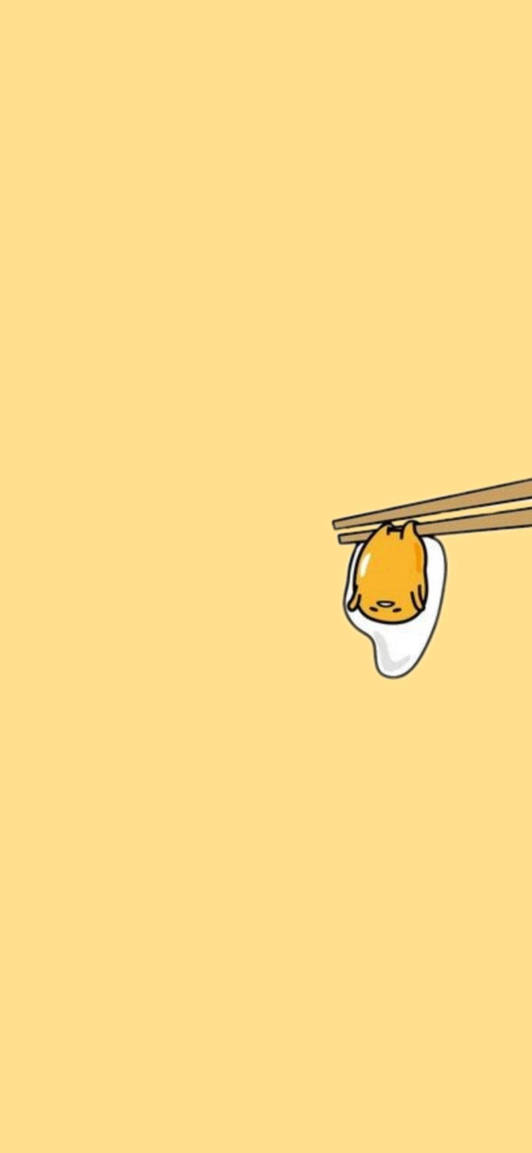 筷子夾著Gudetama簡約美學 壁紙 — 一個可愛的卡通貓臉從筷子夾著的餃子中探出頭來，背景是純黃色。
