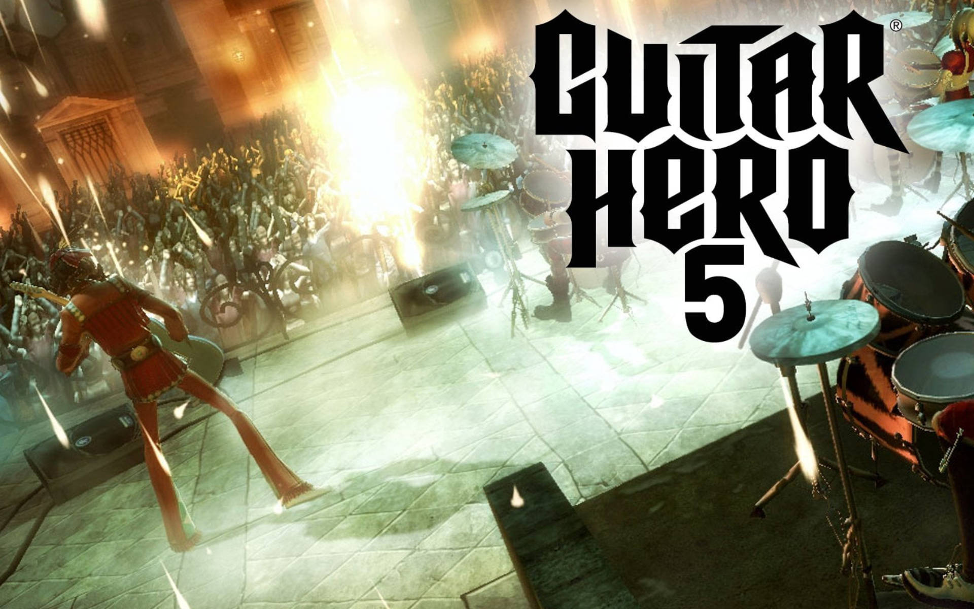 Guitar Hero 5搖滾樂隊演唱會 壁紙 — 一位身穿紅色的結他手在Guitar Hero 5的音樂會場景中，在燈光閃爍的舞台上對著咆哮的人群表演。