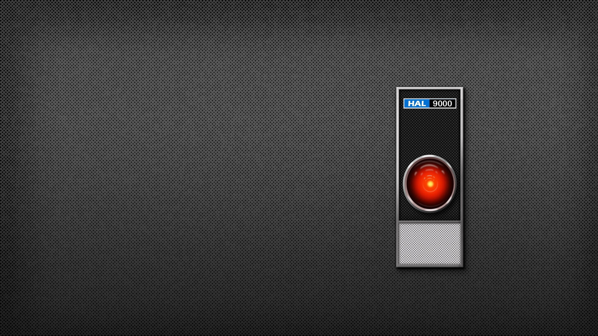 HAL 9000 電腦眼睛在深色紋理牆壁上發出紅光。