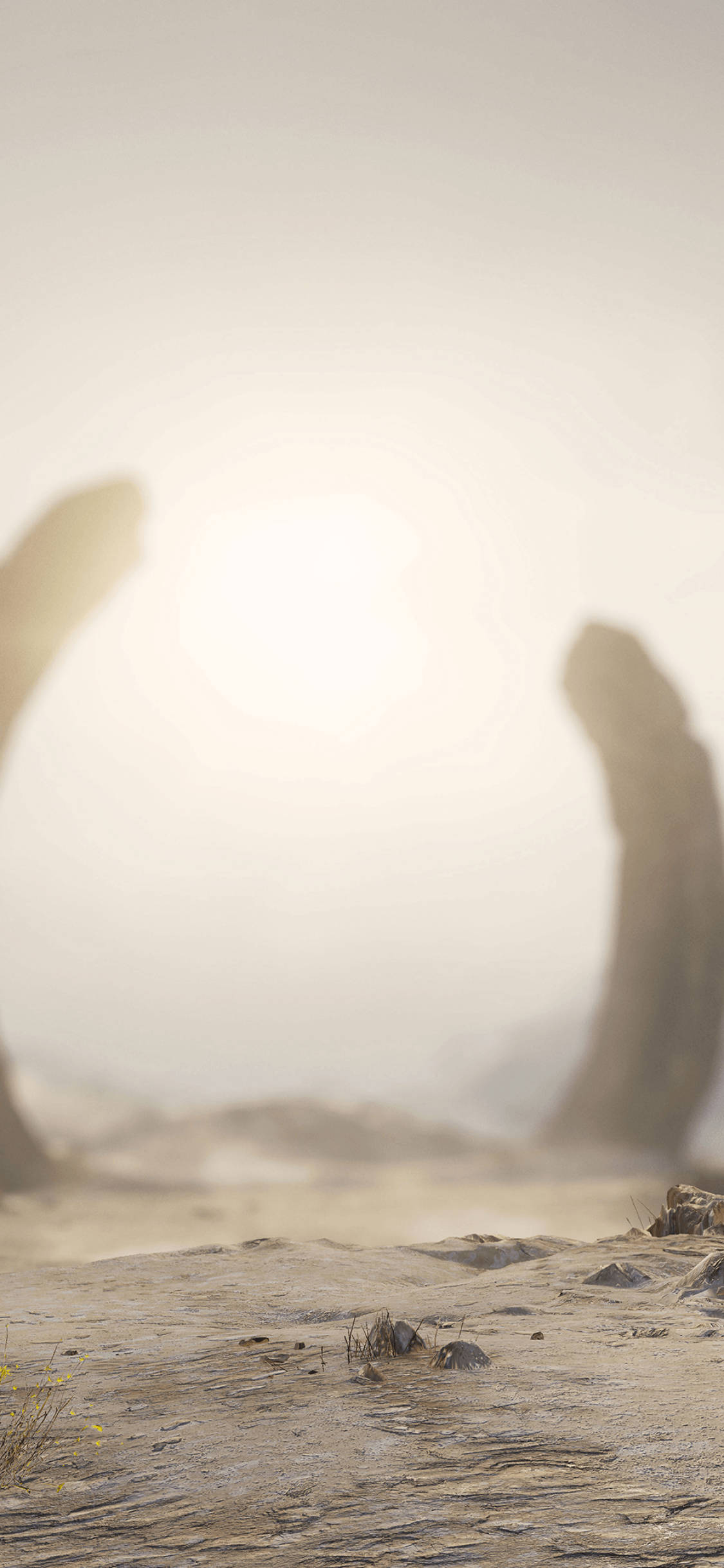Halo Infinite Zeta 環 壁紙 — 一個寧靜的沙漠景觀，兩個大石拱門框住一個在朦朧天空下發光的太陽。