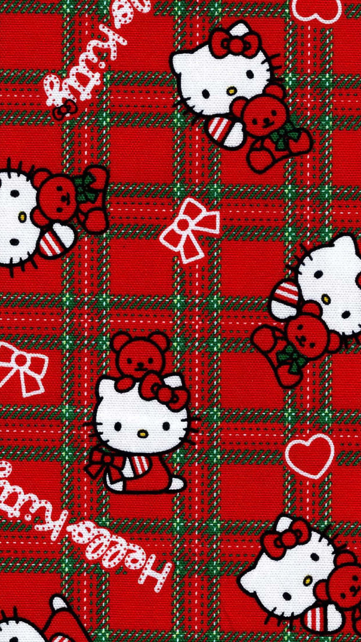 Hello Kitty Christmas 桌布 壁紙 — Hello Kitty 角色在紅色格子圖案中，帶有蝴蝶結和泰迪熊的節日布料。