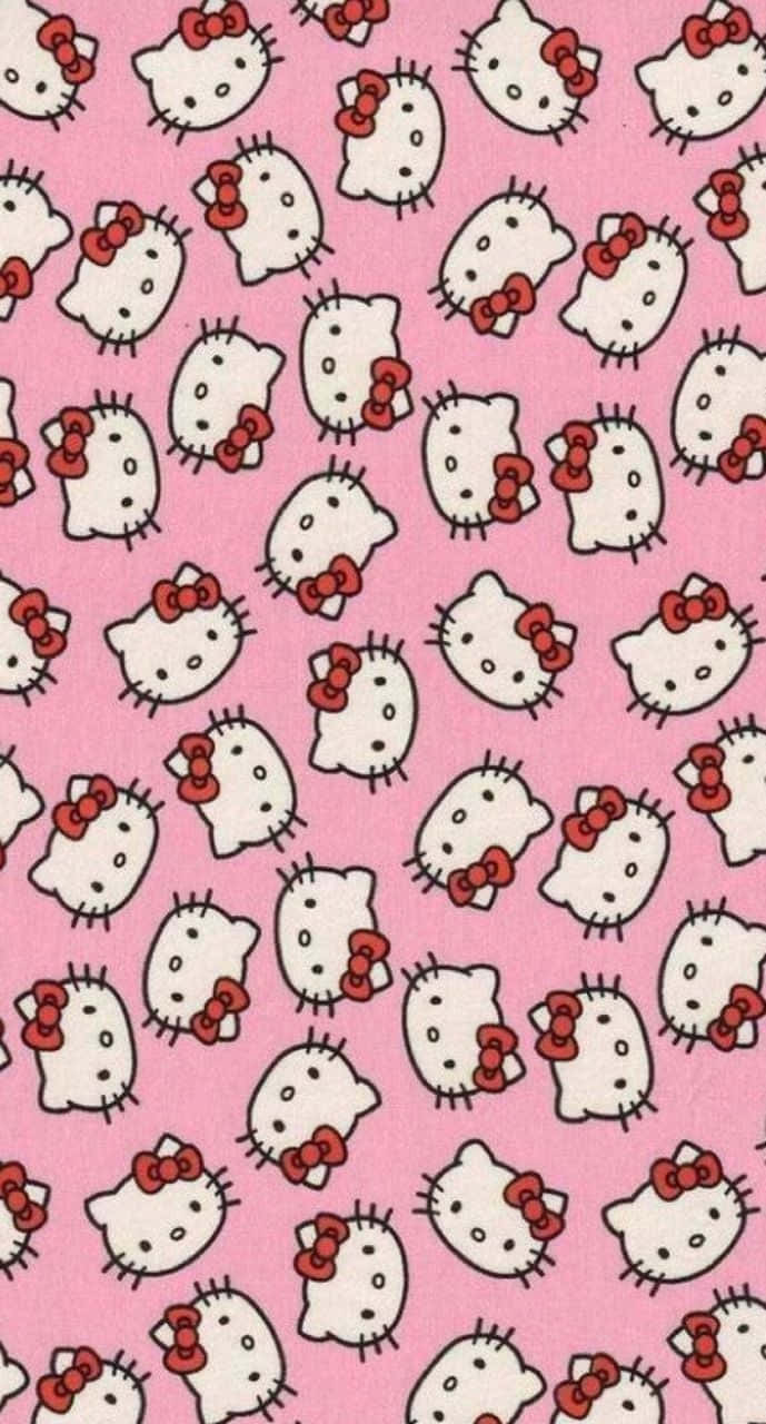 Hello Kitty Y2K 風格粉紅背景 壁紙 — 在純粉紅色背景上重複出現帶有紅色蝴蝶結的白色Hello Kitty面孔。