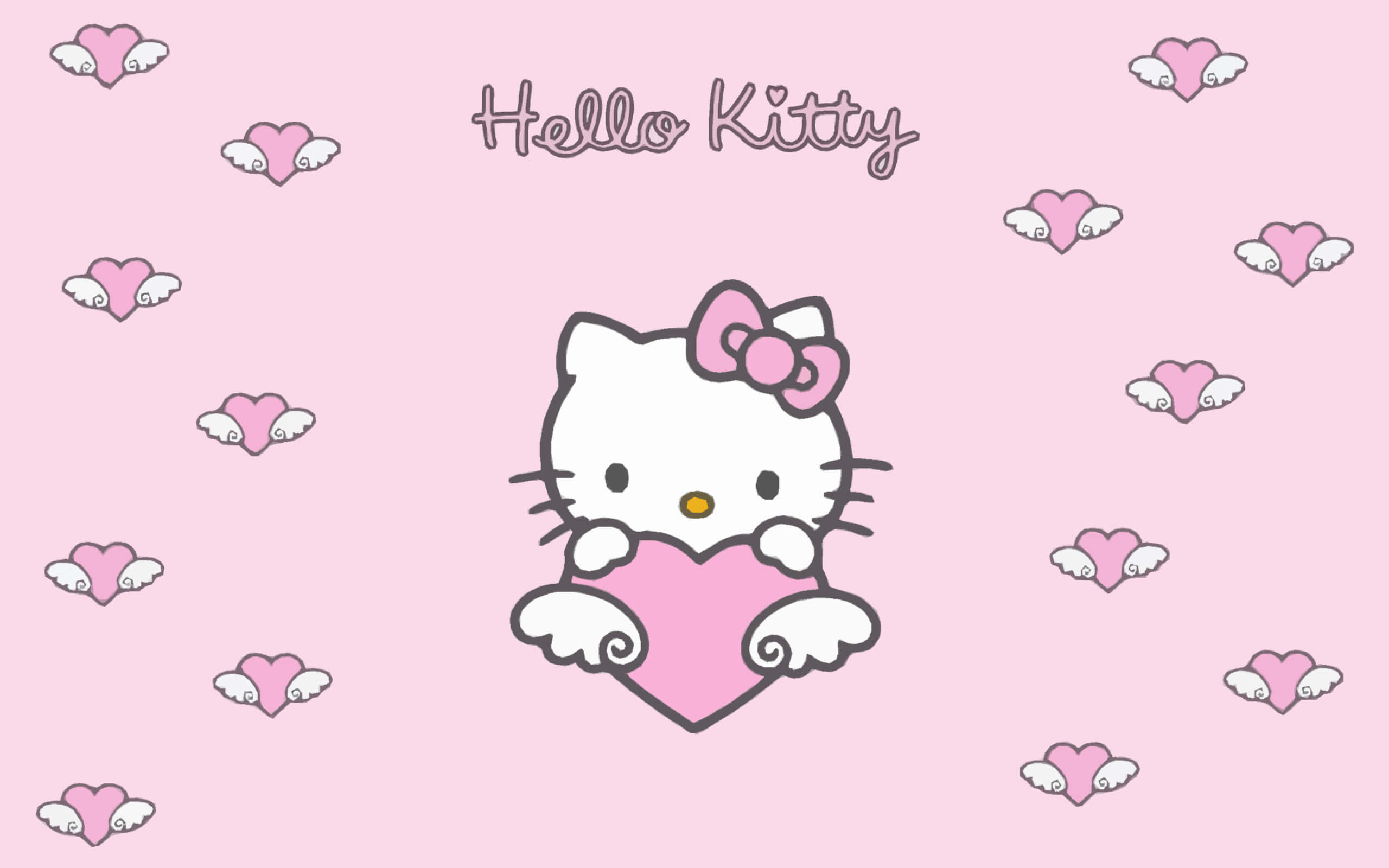 Kitty White 桌布 壁紙 — Hello Kitty 喺柔和粉紅色背景上，手持一個被飄浮有翼心形包圍嘅粉紅色心形。