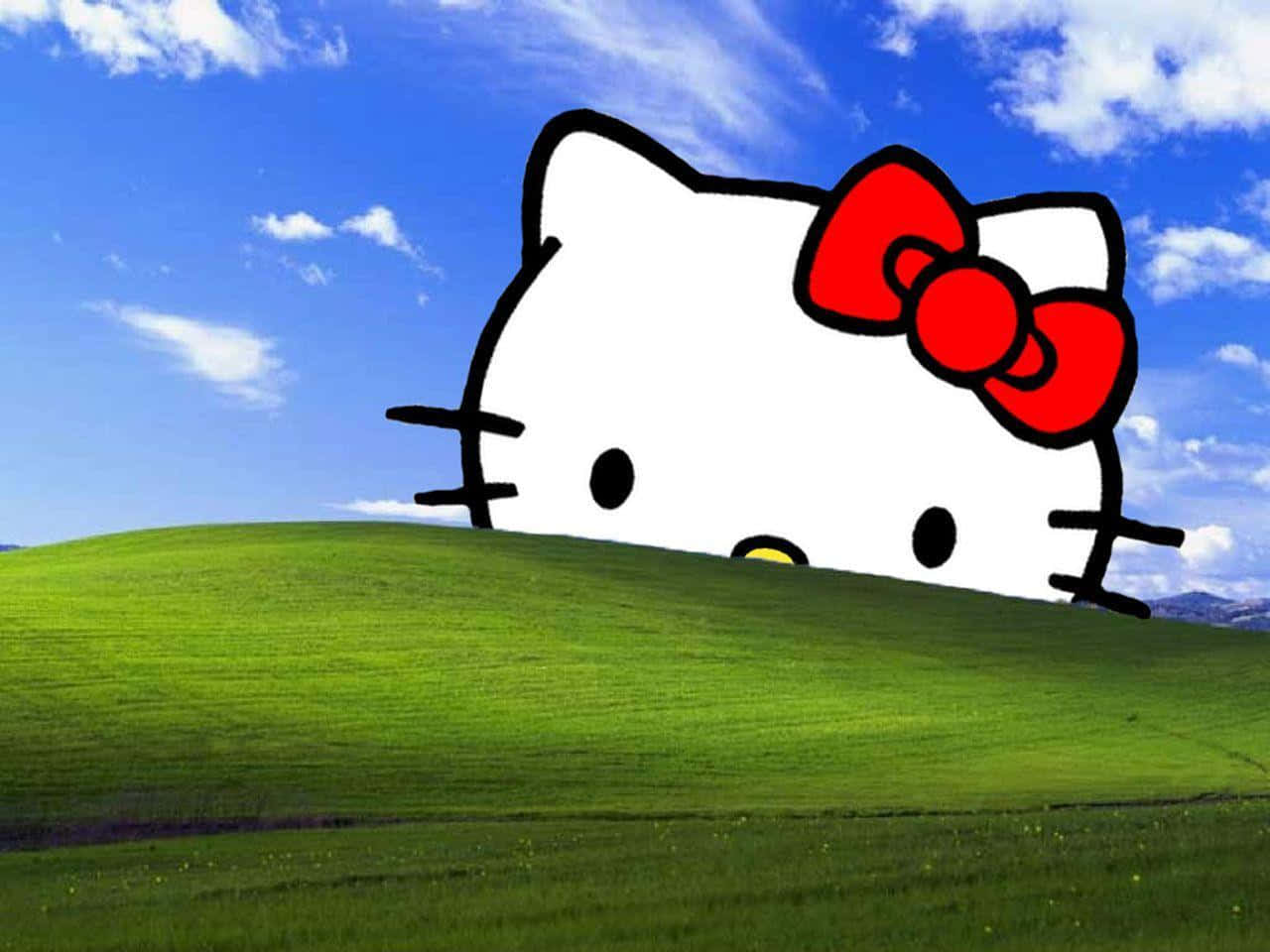Hello Kitty 喺有雲嘅藍天下，喺綠色山丘上探出頭嚟。 — 桌面 壁紙