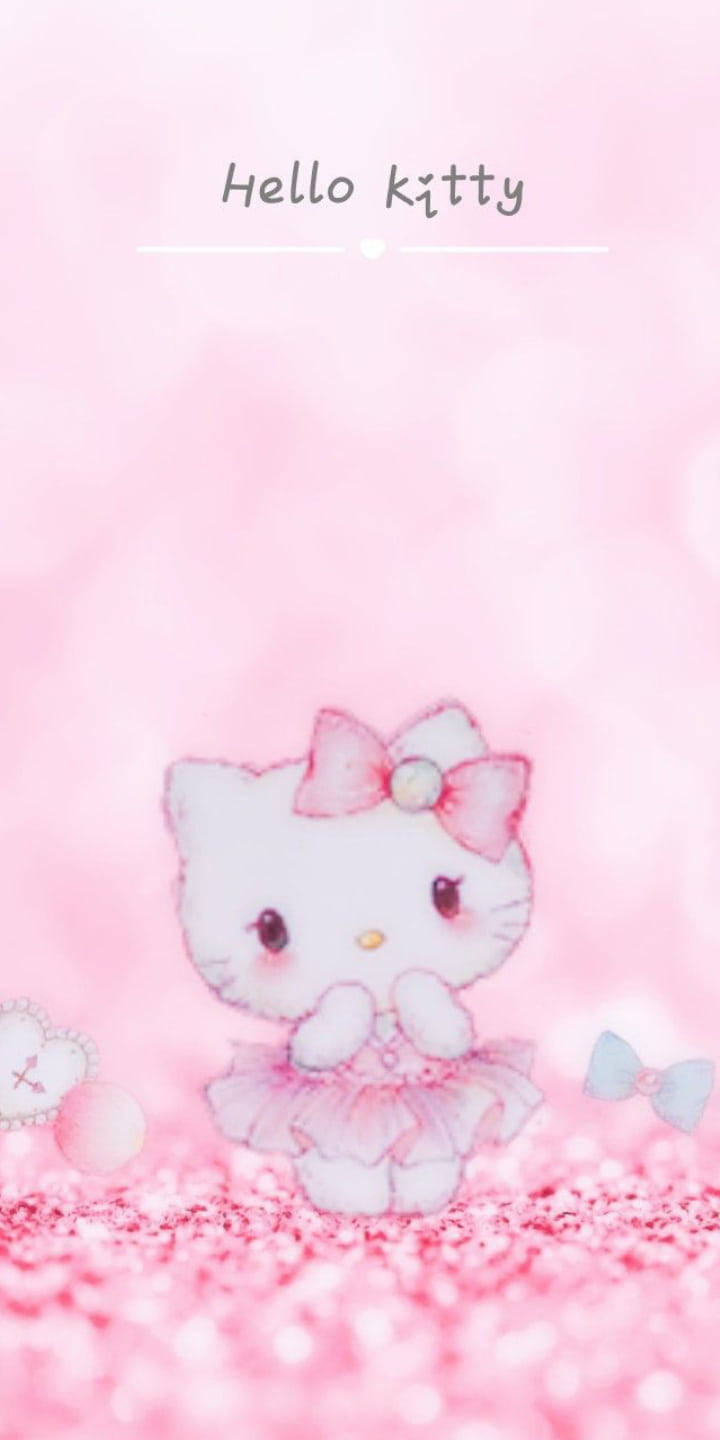 Hello Kitty 身穿粉紅色芭蕾舞裙，站在閃閃發光的地面上，背景是柔和的粉紅色。 — Hello kitty 美學 GIF 壁紙