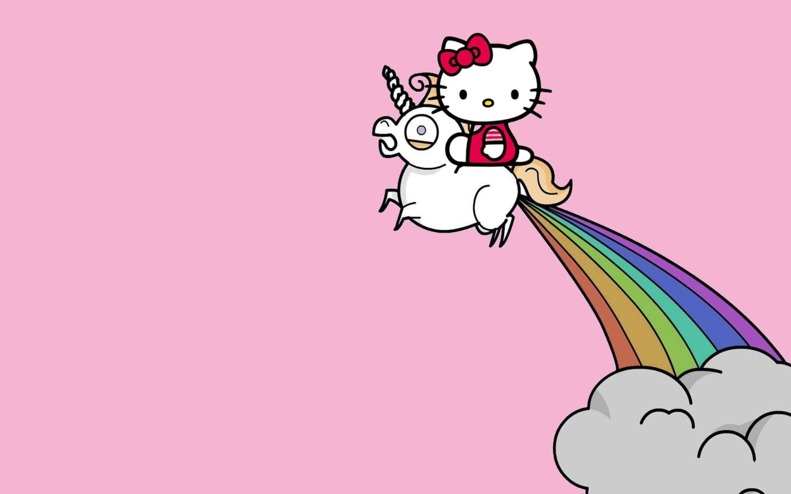 Kawaii Unicorn 桌布 壁紙 — Hello Kitty 騎著一隻微笑的獨角獸，牠有彩虹尾巴，在柔和的粉紅色天空背景下翱翔於雲端之上。