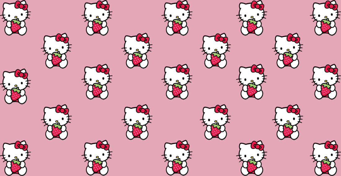 Hello Kitty在粉紅色背景上手持草莓