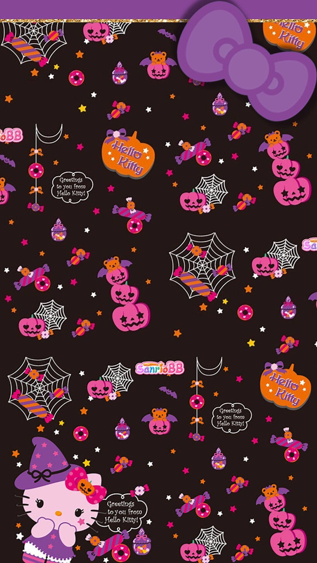 Hello Kitty萬聖節紫色主題 壁紙 — Hello Kitty 戴著巫師帽，被粉紅色南瓜、蜘蛛和星星包圍，背景為深色。