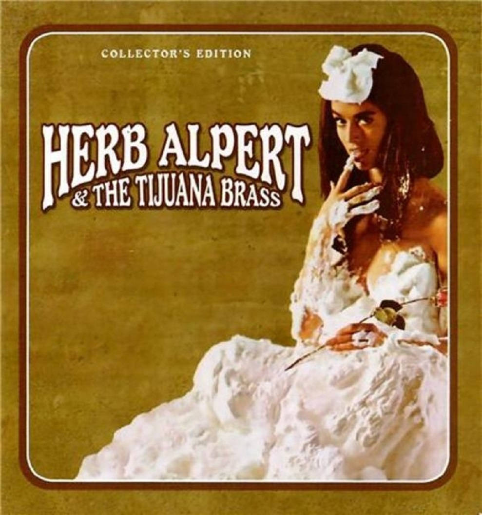 Herb Alpert And The Tijuana Brass 收藏版專輯 壁紙 — 一張復古專輯封面，一位身穿白色蕾絲長裙的女子在紋理金色背景前手持玫瑰。