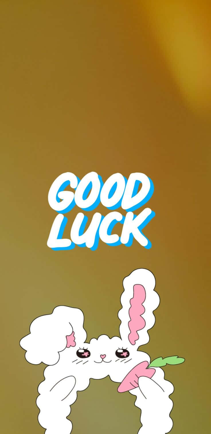  壁紙 — 一隻可愛的卡通兔仔喺溫暖漸變背景上，喺粗體「GOOD LUCK」文字下面拎住一條紅蘿蔔。