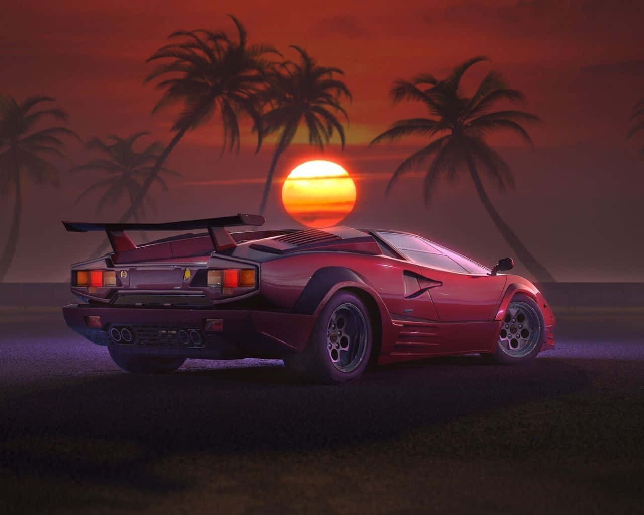 Sunset Drive 桌布 壁紙 — 一輛紅色林寶堅尼Countach停泊在日落時分的沙灘上，棕櫚樹在火紅的橙色天空映襯下形成剪影。