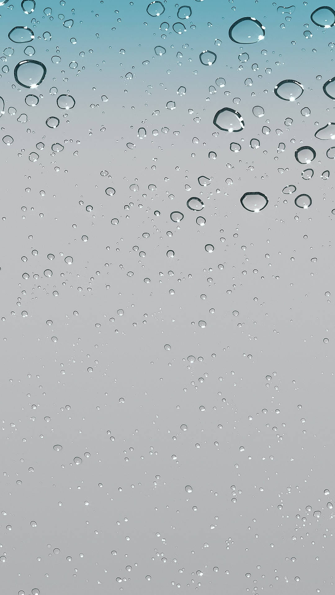 玻璃上的雨滴，背景為藍綠色到灰色的漸變。