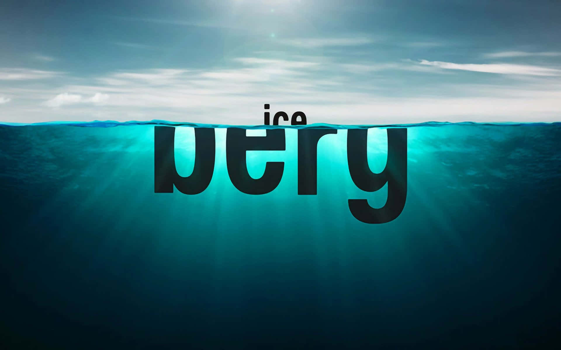 Iceberg 桌布 壁紙 — 「ice」呢個字浮喺水上面，而「very」就沉落一個深藍色嘅海入面，有陽光穿透落嚟。