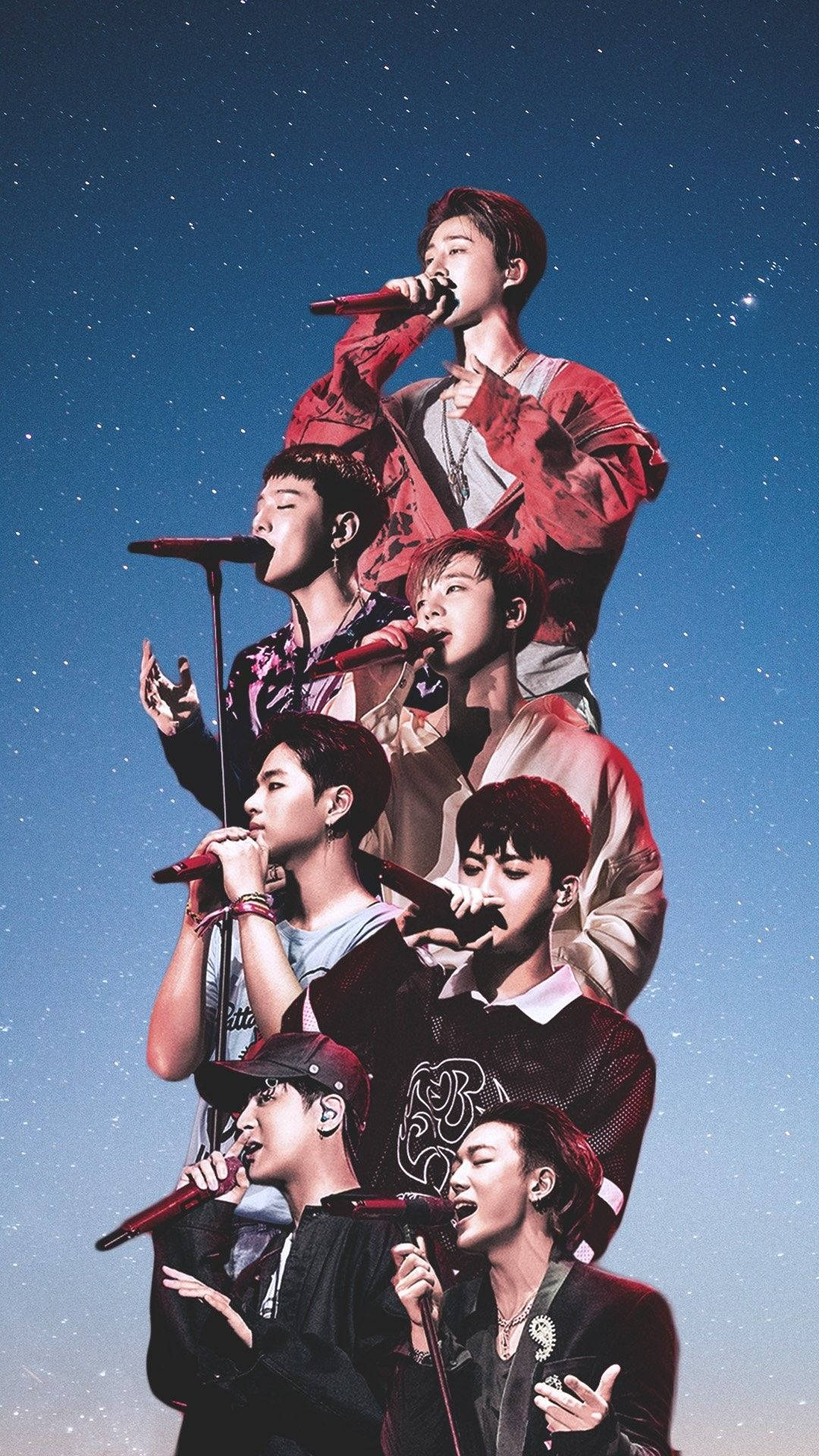 七位K-pop歌手在星空下舞台上表演。