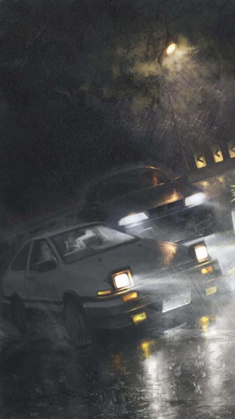 Initial D 手機雨中賽車 壁紙 — 兩輛汽車在夜間大雨中競速，車頭燈劃破濕滑街道上的傾盆大雨。