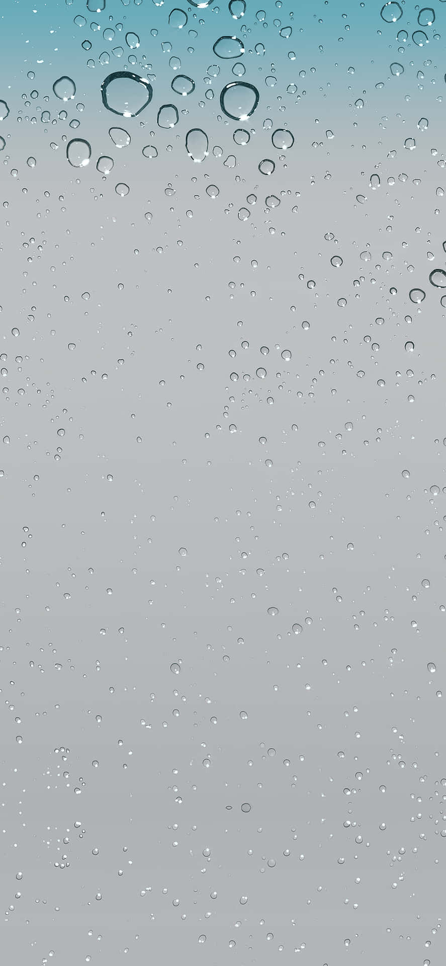 窗戶上的雨滴，背景為漸變天空。