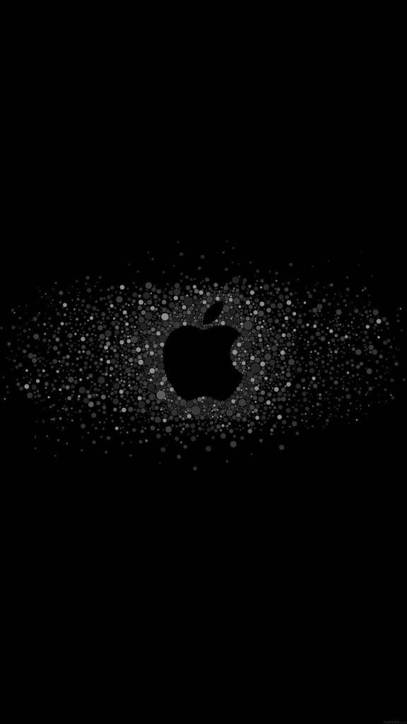 iOS Apple 標誌極簡暗黑 iPhone 壁紙 — 一個極簡的黑色Apple標誌從白色點點的爆炸中浮現，背景是純黑色。