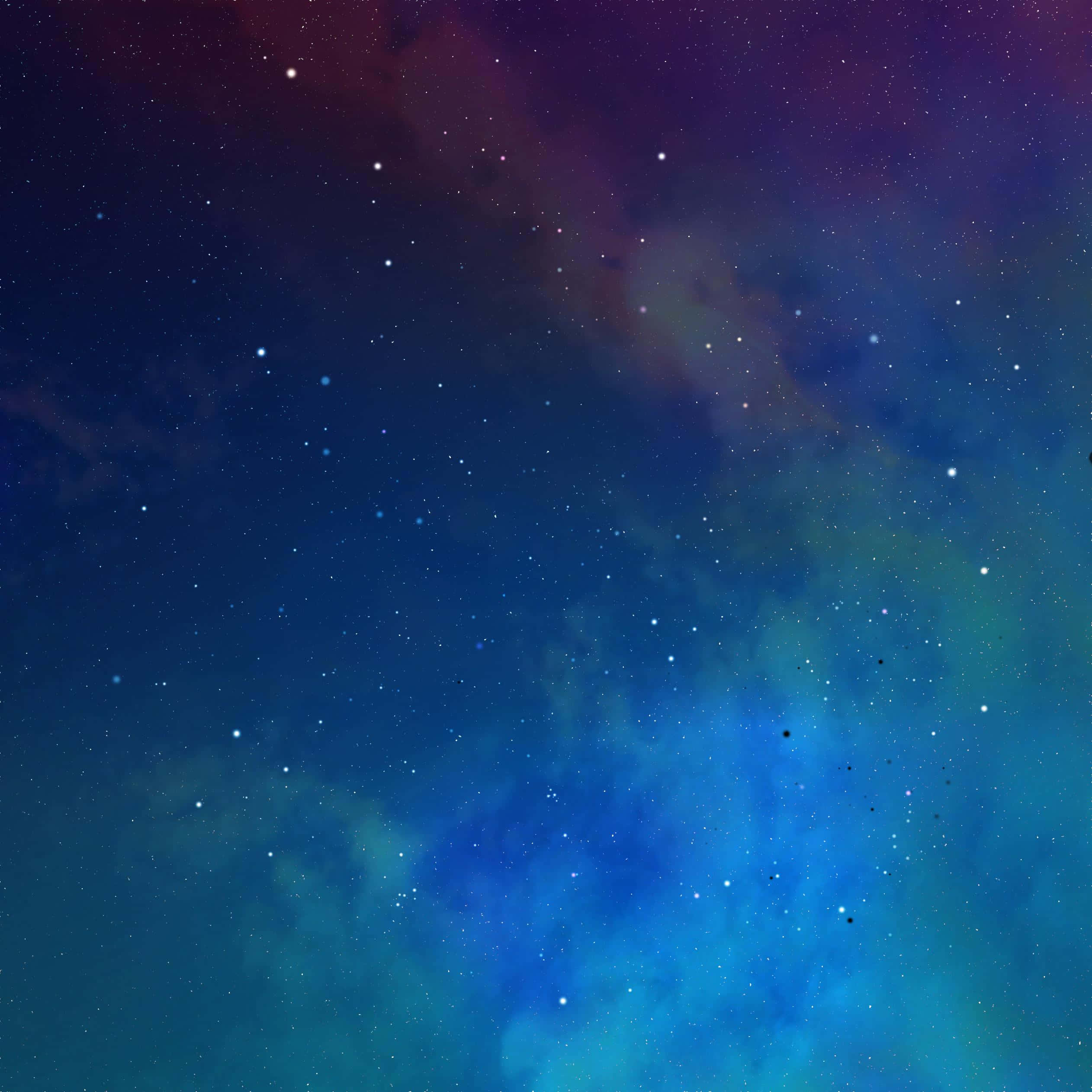 iPad Air 2 能做任何事 壁紙 — 在深紫色天空下，深藍色和藍綠色的星雲點綴著閃爍星星的宇宙廣闊空間。