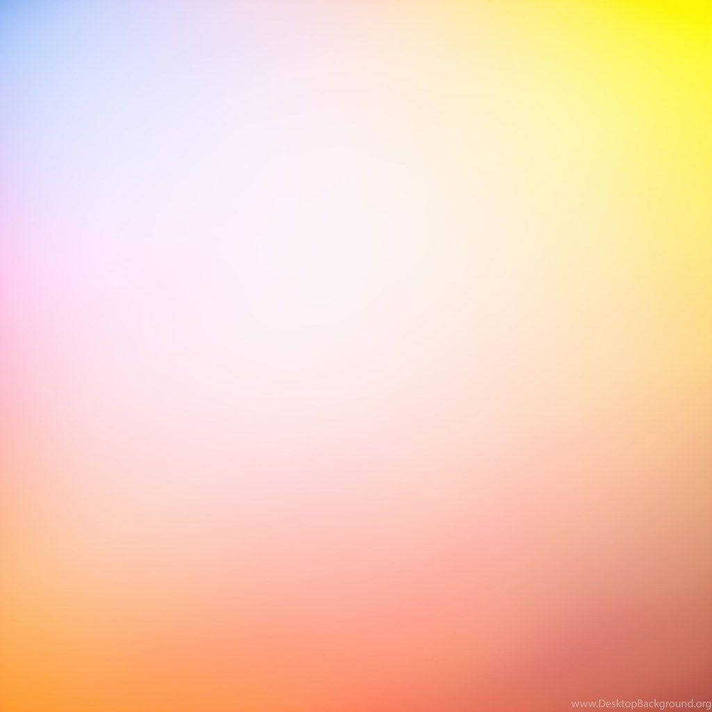 iPad Pro 彩色漸層壁紙 壁紙 — 柔和的漸變天空從冷藍色過渡到溫暖的黃色和橙色色調。