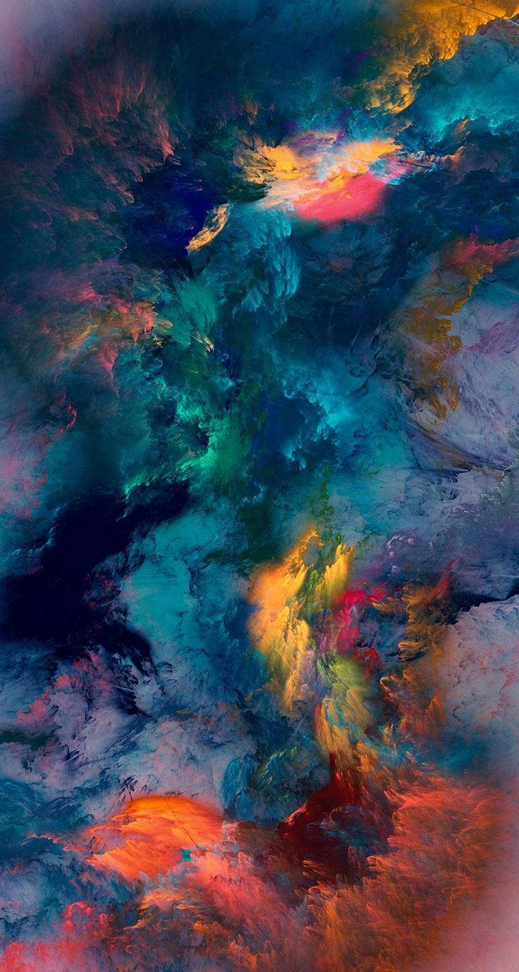 在太空中旋轉的彩色宇宙星雲，帶有藍色、藍綠色和火橙色。