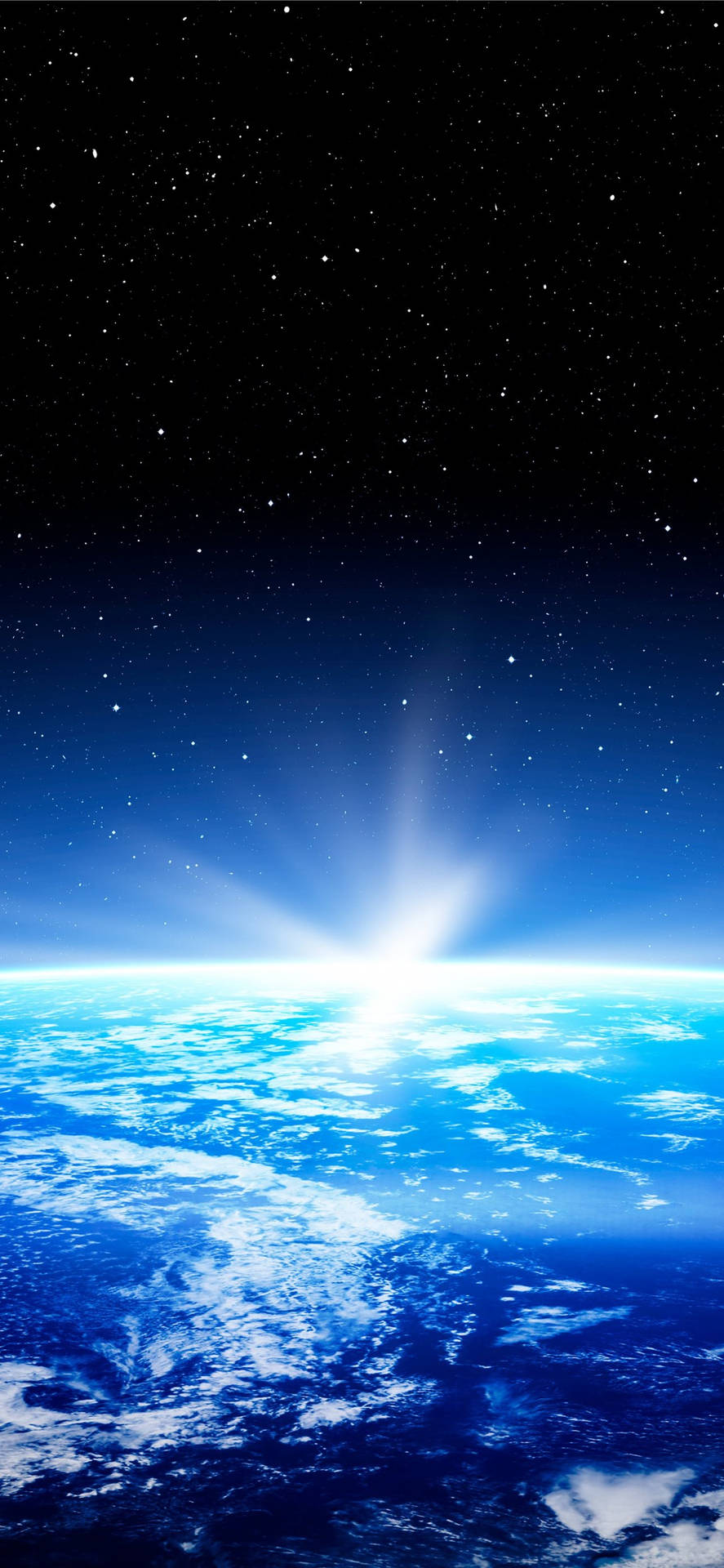 從太空看地球日出，背景有星星。