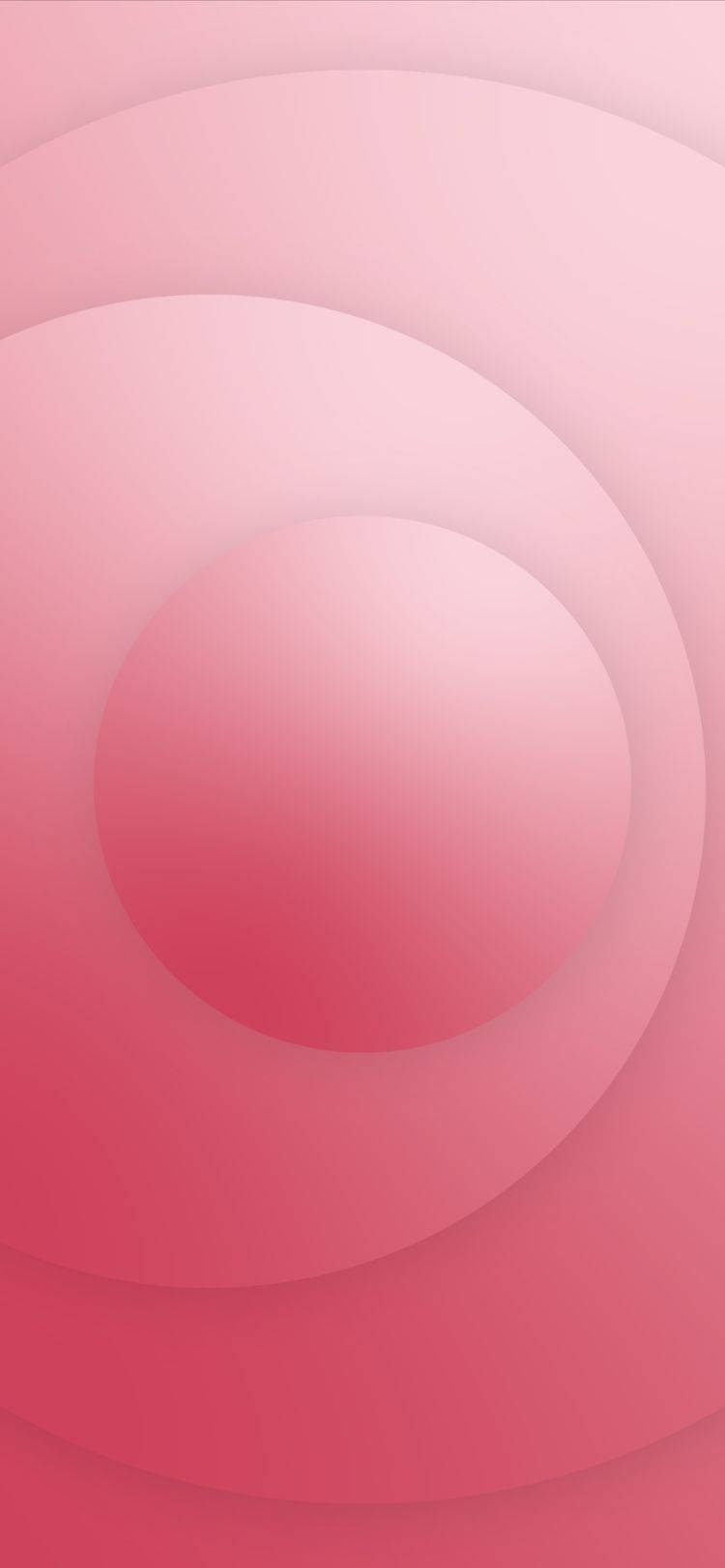 帶有柔和重疊圓圈的抽象粉紅色漸變。 — 粉紅色 iPhone 壁紙