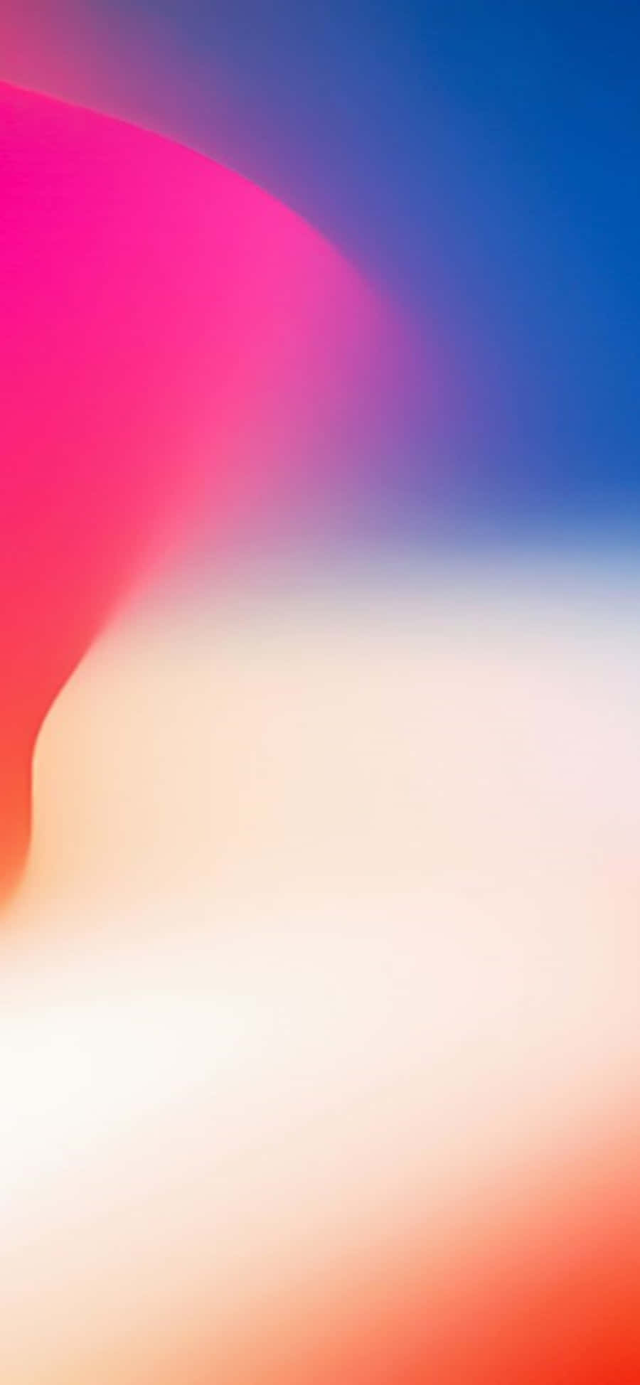 體驗經典 iPhone 壁紙 — 從洋紅色到藍色和奶油色的鮮豔抽象漸變流動，呈現柔和模糊的動感。