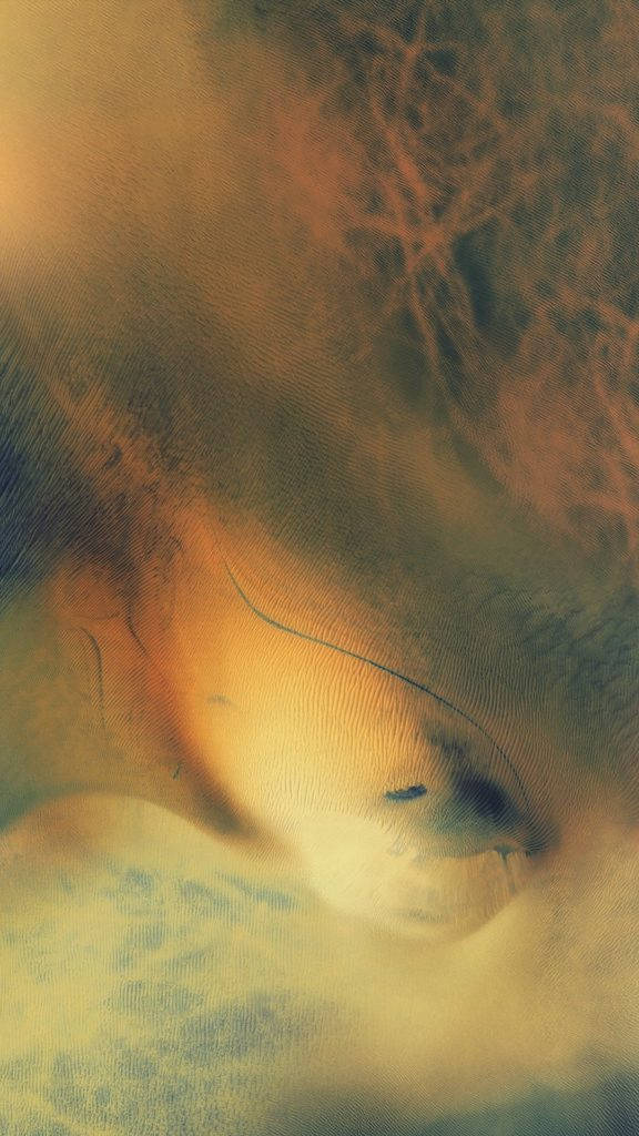 帶有暖色調和紋理漸變的抽象宇宙漩渦