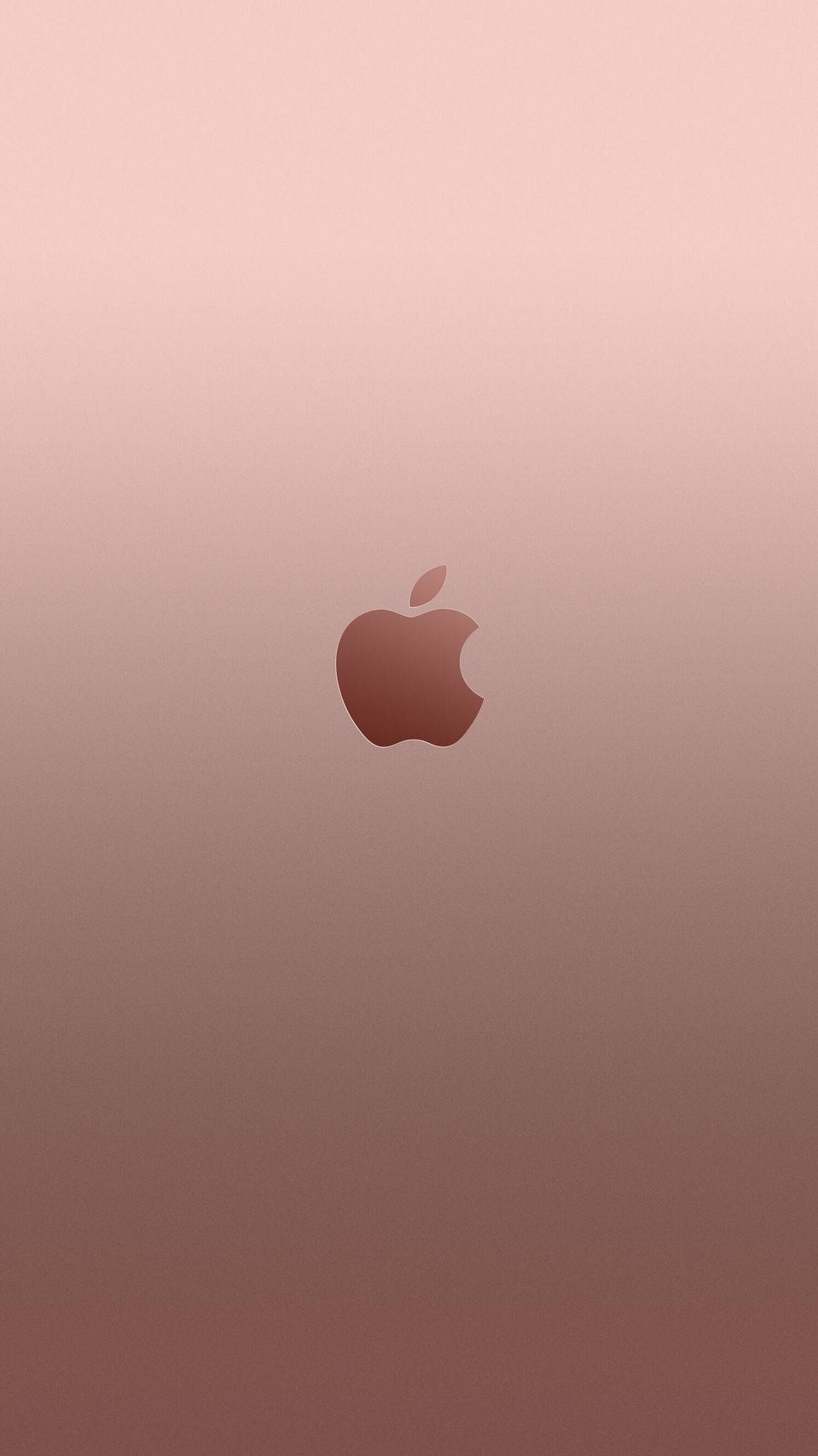 iPhone 6s 上迷人的金色外觀 壁紙 — 一個極簡玫瑰金漸變背景，中央有一個帶咬痕和葉子的Apple標誌。