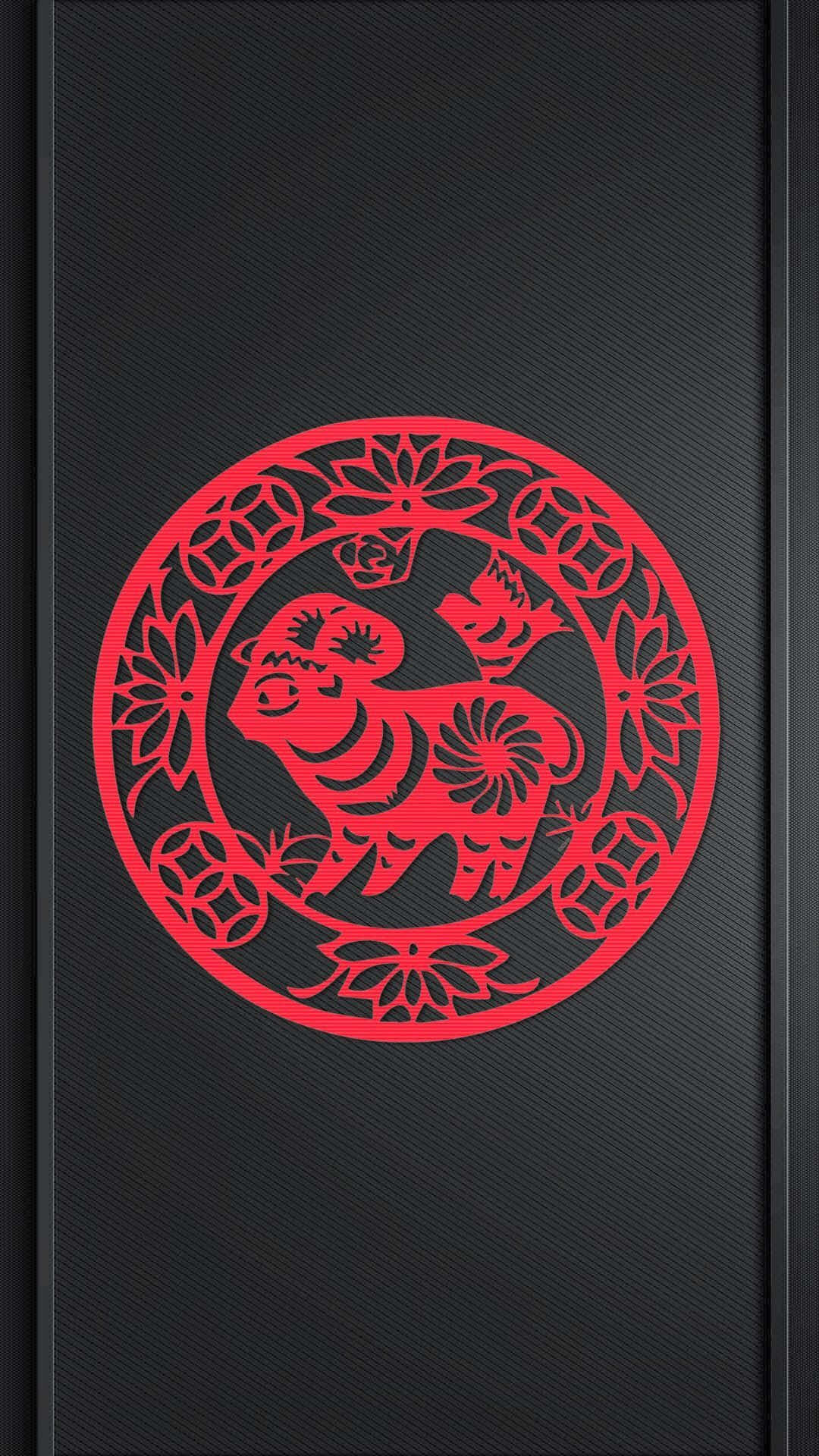 以iPhone慶祝中國新年 壁紙 — 在帶有紋理的黑色背景上，一個圓形框架內充滿活力的紅色剪紙公牛和兒童設計。